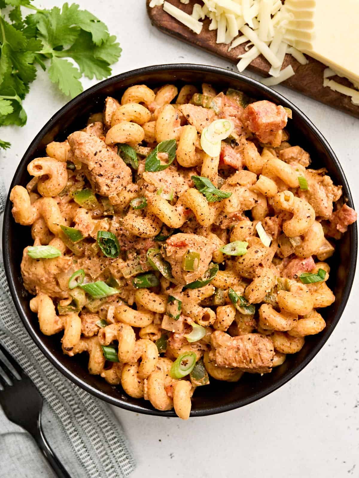 Overhead view of a bowl of creamy chicken fajita pasta.